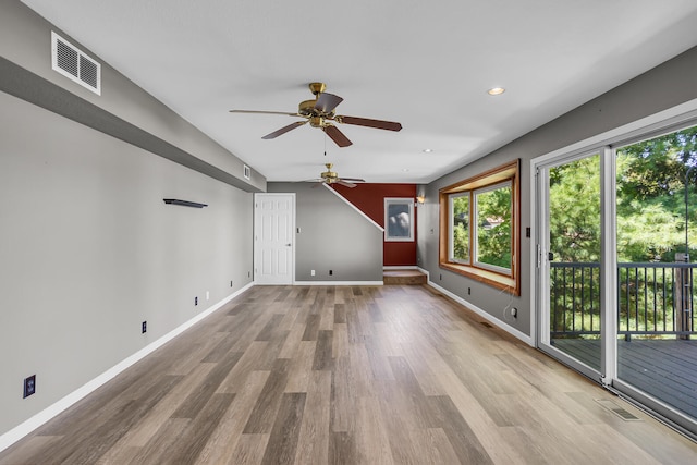 interior space with visible vents, recessed lighting, baseboards, and wood finished floors