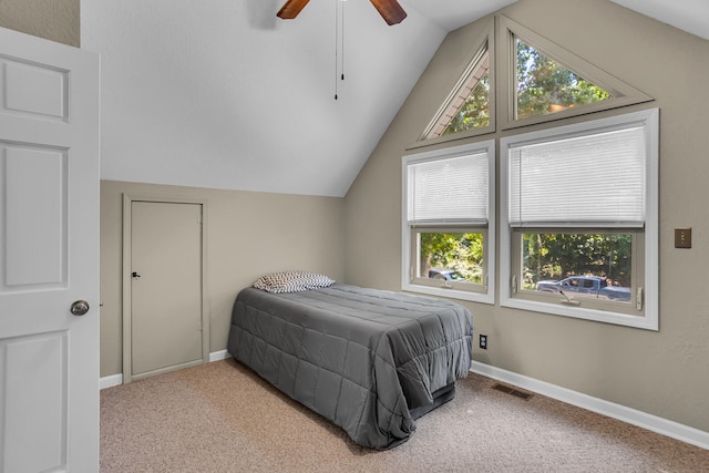 bedroom with visible vents, baseboards, carpet, lofted ceiling, and a ceiling fan