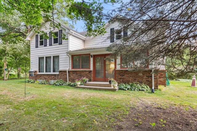 view of front of house with a front lawn