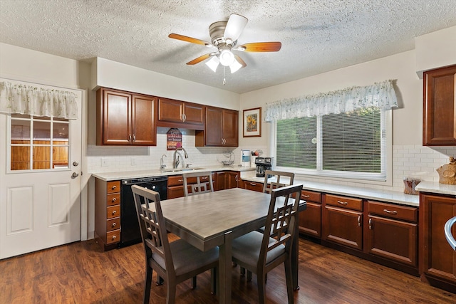 kitchen with sink, dishwasher, dark hardwood / wood-style flooring, and backsplash