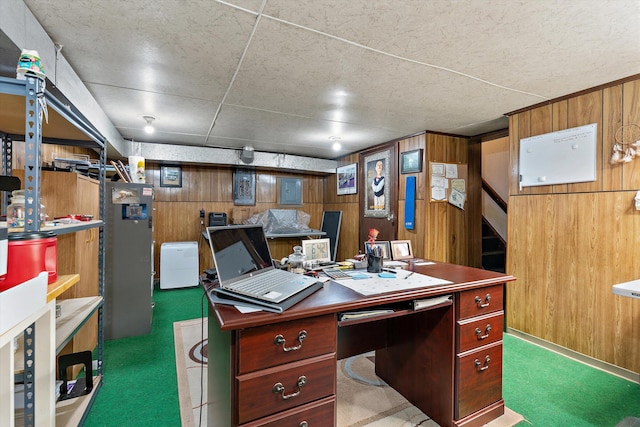 carpeted home office with wooden walls