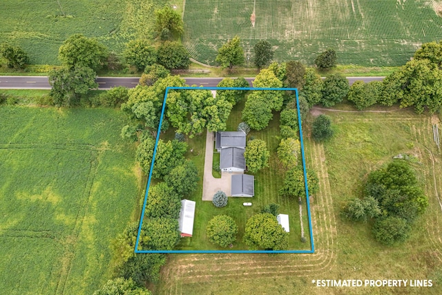 birds eye view of property featuring a rural view