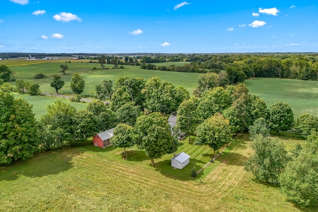 birds eye view of property with a rural view