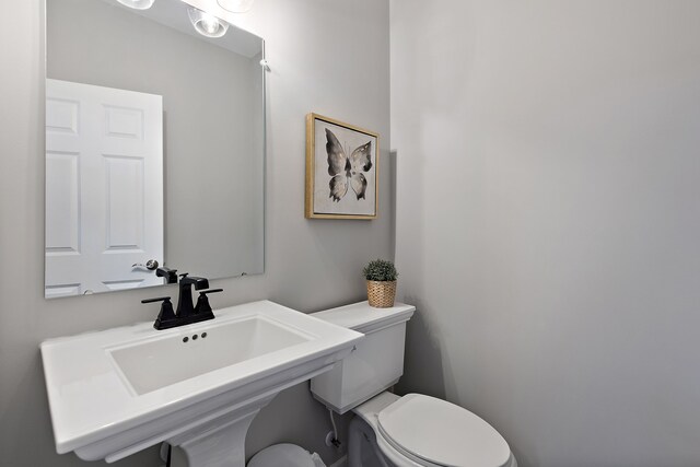00 Hidden River Dr, Armada, MI 48005 - bathroom featuring toilet and a sink