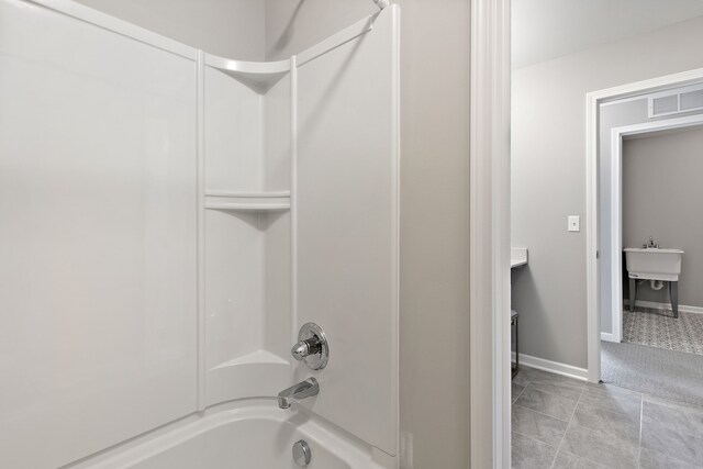 00 Hidden River Dr, Armada, MI 48005 - full bath featuring  shower combination, baseboards, and tile patterned flooring