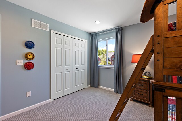 00 Hidden River Dr, Armada, MI 48005 - bedroom featuring carpet flooring, a closet, and baseboards