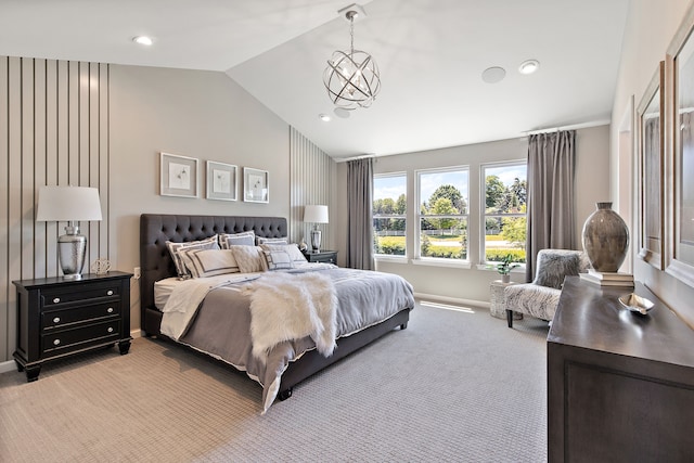 bedroom with carpet floors, a chandelier, and lofted ceiling