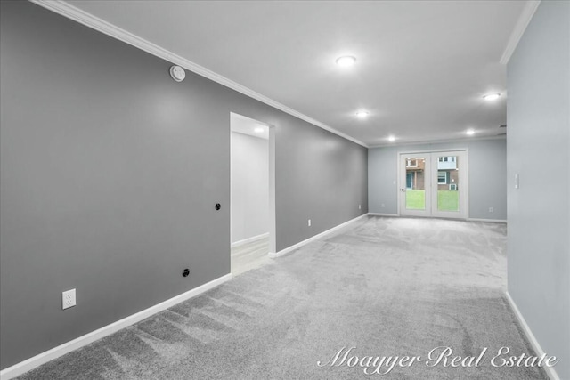 below grade area with carpet floors, recessed lighting, crown molding, and baseboards