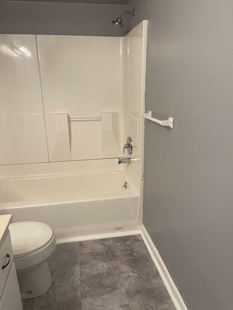 full bathroom featuring vanity, shower / bathtub combination, and toilet