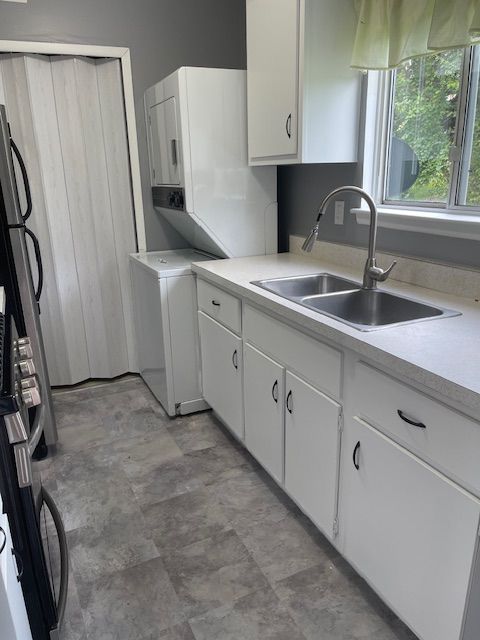 kitchen with white cabinets and sink