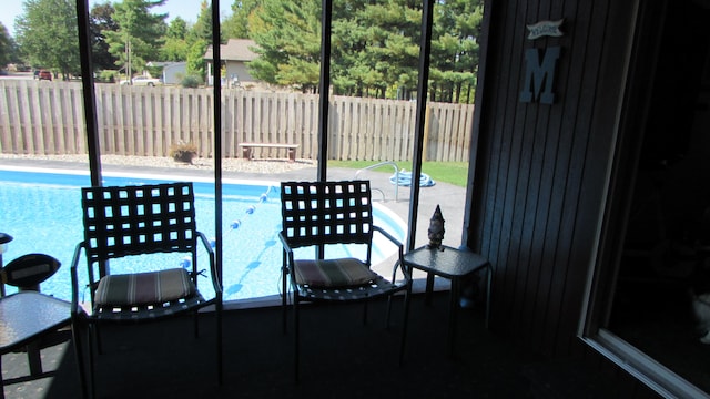 view of patio / terrace featuring a fenced in pool