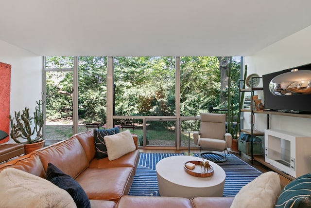 sunroom / solarium featuring a healthy amount of sunlight