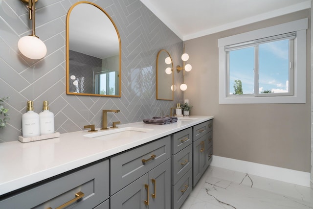 bathroom with vanity and decorative backsplash