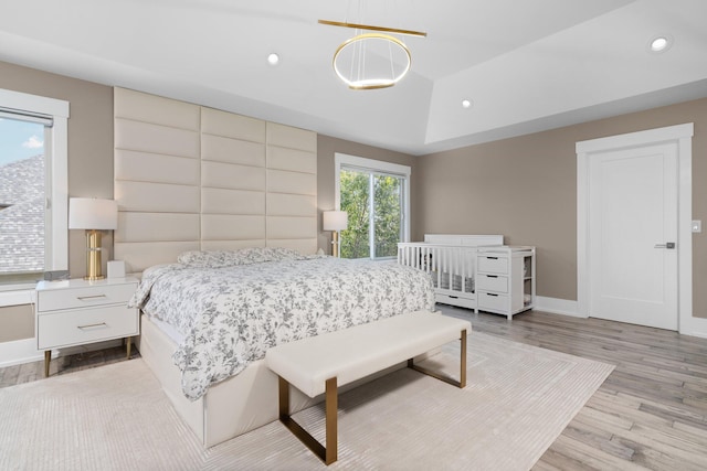 bedroom with light wood-type flooring