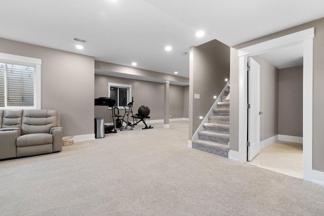 interior space featuring light colored carpet