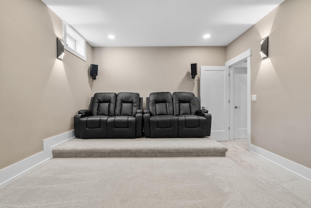 home theater room with light carpet