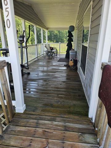 wooden terrace with covered porch