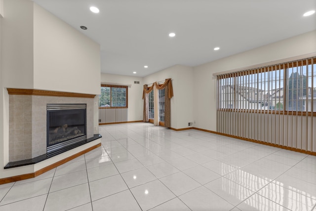 unfurnished living room featuring light tile patterned floors