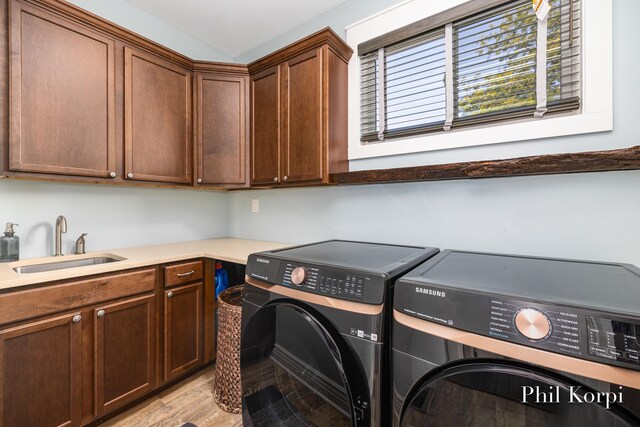 250 Shore Dr, Wayland, MI 49348 - laundry room with washing machine and dryer and cabinet space