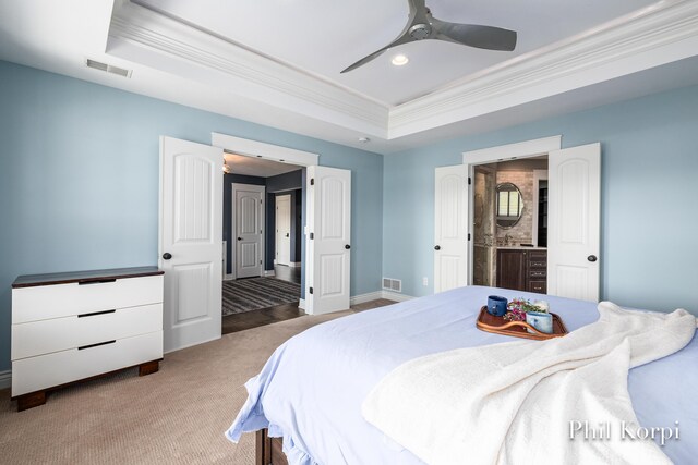 250 Shore Dr, Wayland, MI 49348 - carpeted bedroom featuring a raised ceiling, ornamental molding, baseboards, recessed lighting, and a ceiling fan