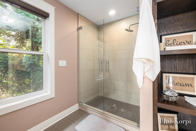 250 Shore Dr, Wayland, MI 49348 - bathroom featuring baseboards, a stall shower, and recessed lighting