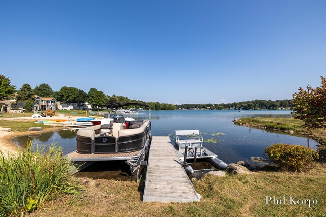 250 Shore Dr, Wayland, MI 49348 - dock featuring a water view