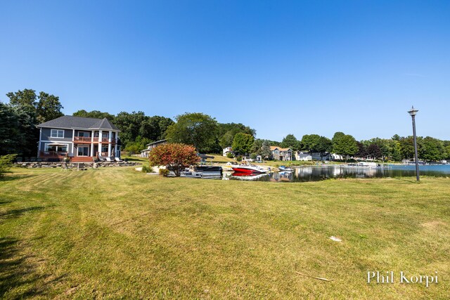 250 Shore Dr, Wayland, MI 49348 - view of grassy yard with a water view and a balcony