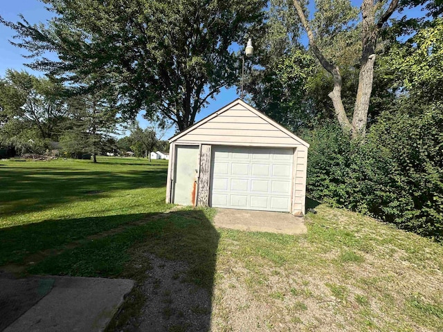 garage with a yard