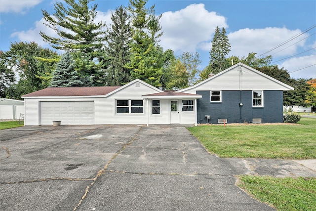 5344 Lapeer Rd, Burton, MI 48509 - view of front of property featuring a front lawn, brick siding, and crawl space