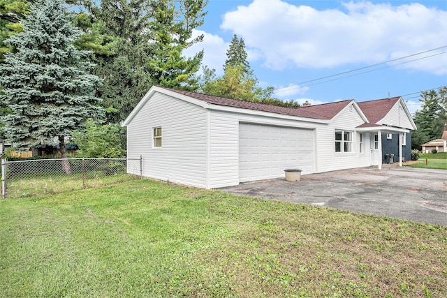 5344 Lapeer Rd, Burton, MI 48509 - garage featuring driveway