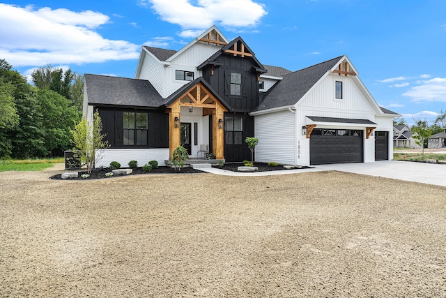 modern inspired farmhouse featuring a garage