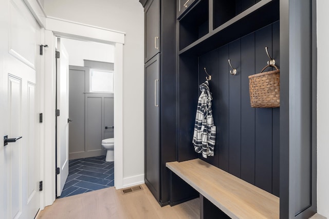 mudroom featuring visible vents