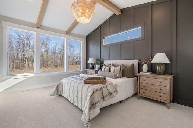 bedroom featuring lofted ceiling with beams, multiple windows, light colored carpet, and a chandelier