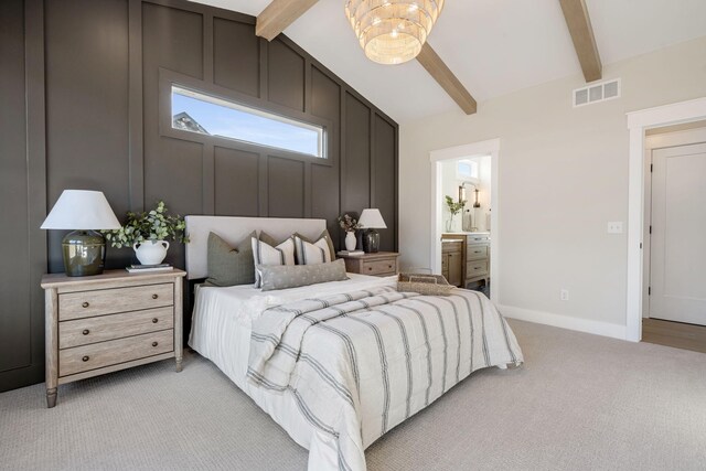 bedroom with visible vents, connected bathroom, baseboards, light colored carpet, and lofted ceiling with beams