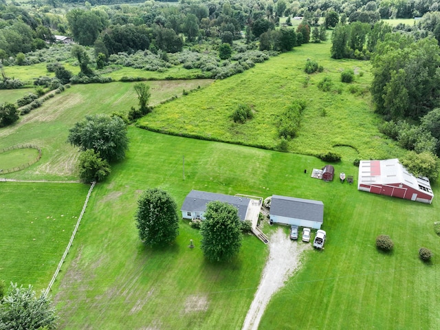 birds eye view of property featuring a rural view