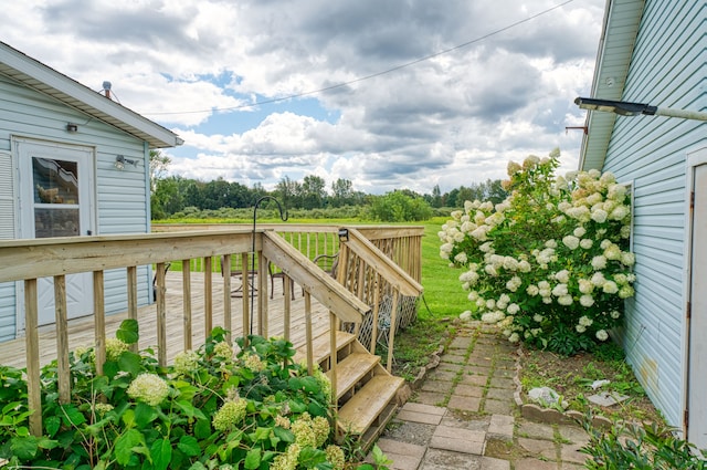 view of yard with a wooden deck