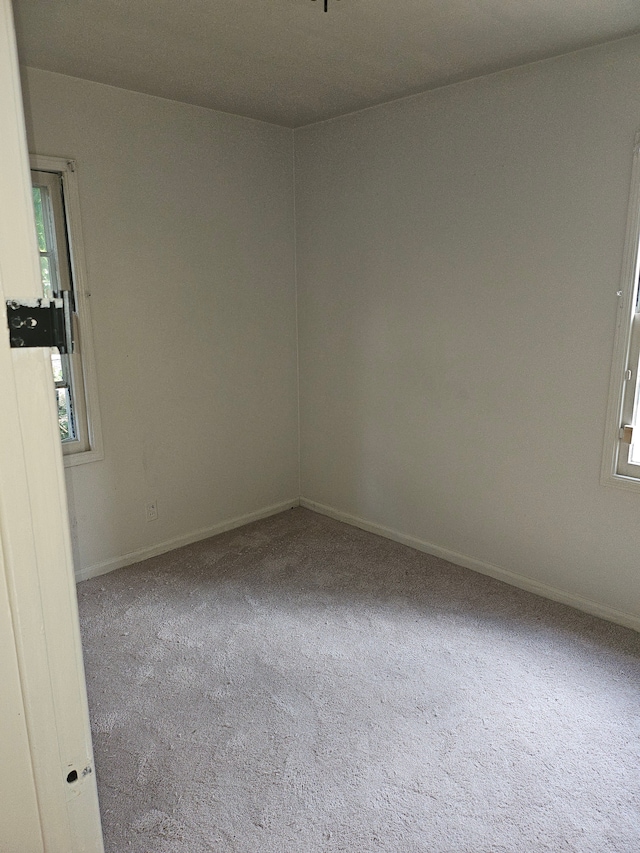 view of carpeted spare room