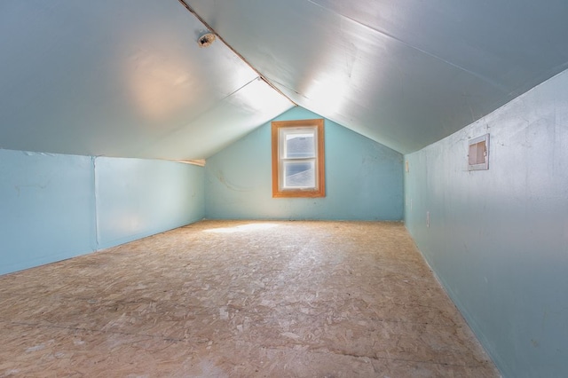 bonus room with vaulted ceiling