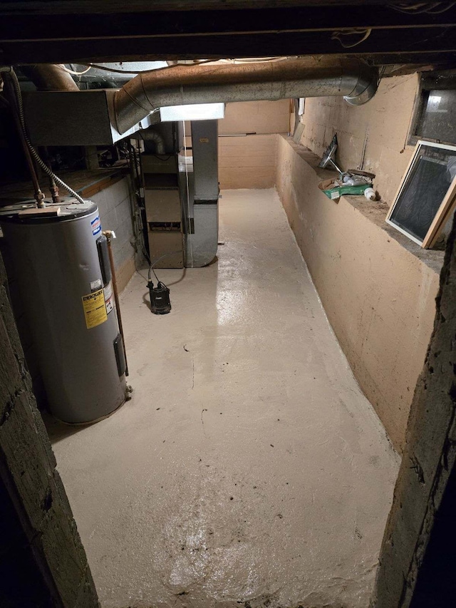 basement with electric water heater and heating unit