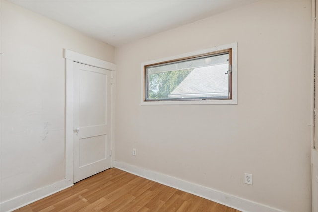 unfurnished room featuring light wood-type flooring