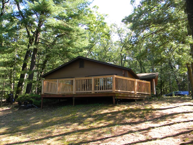 view of front of house featuring a wooden deck