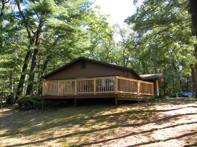 115 S Emerson Dr, Branch, MI 49402 - back of property featuring a wooden deck