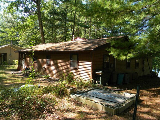 115 S Emerson Dr, Branch, MI 49402 - view of home's exterior featuring a shingled roof