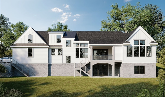 back of house featuring a balcony and a yard