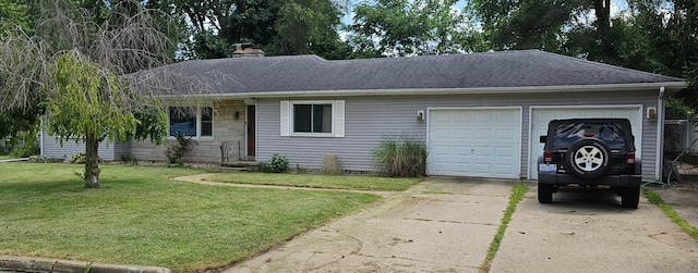 single story home featuring a garage and a front lawn