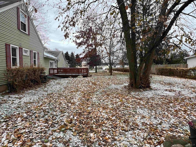 view of yard layered in snow