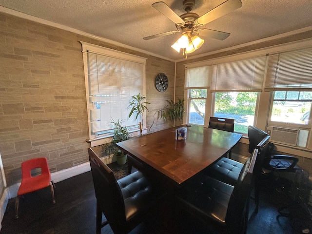 dining space with a textured ceiling, crown molding, ceiling fan, and cooling unit