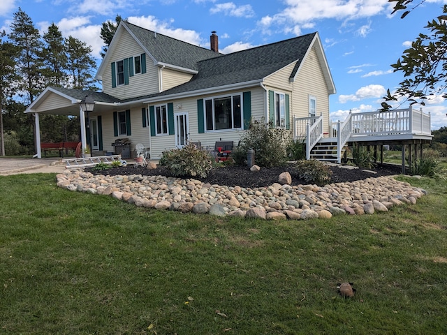 exterior space featuring a deck and a yard