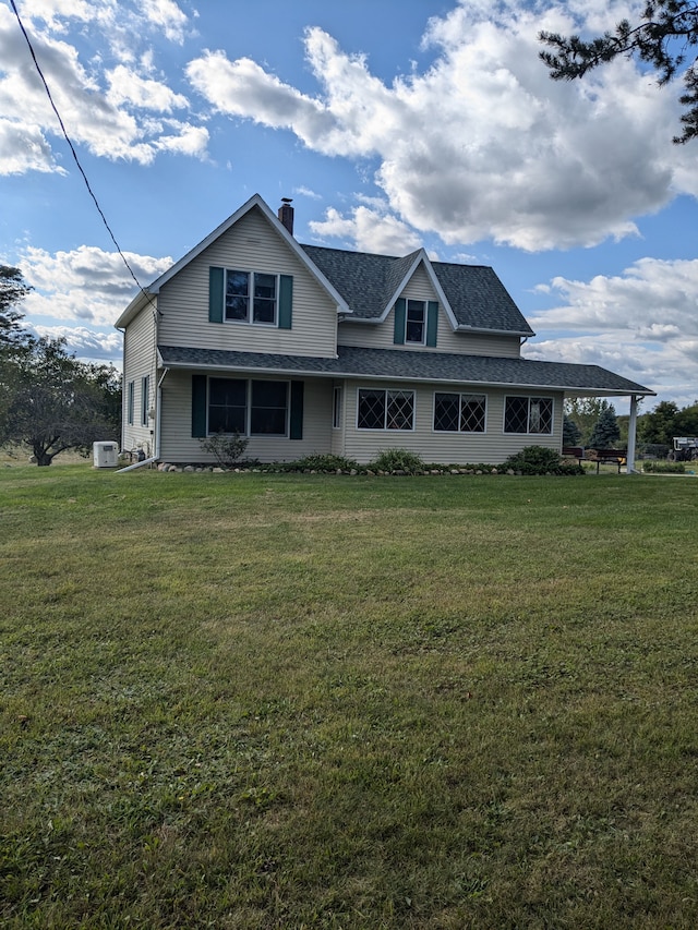 view of front of home with a front yard