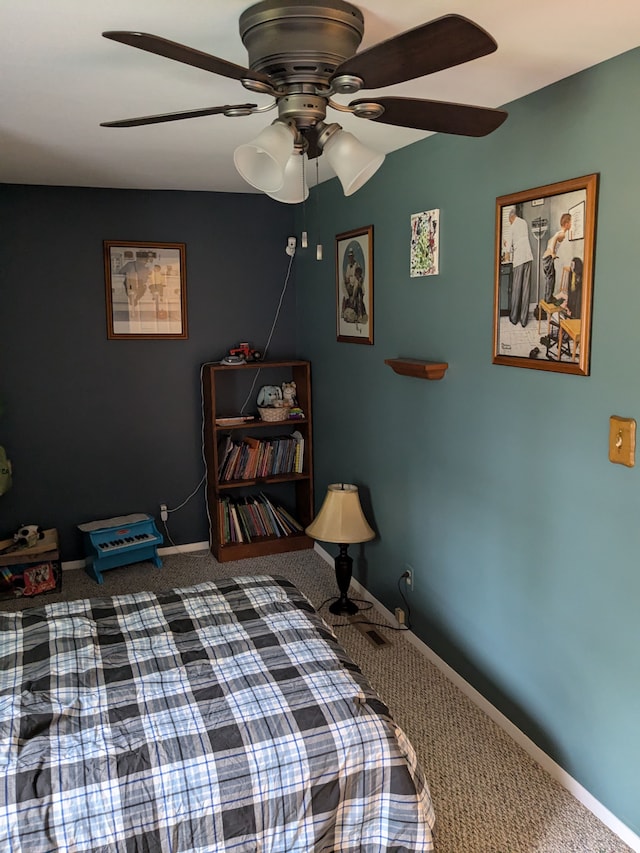 bedroom with ceiling fan and carpet